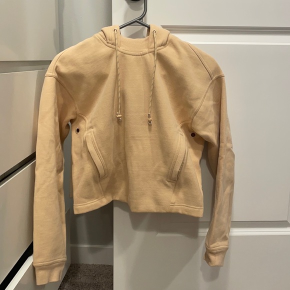 lululemon athletica Tops - Lululemon hoodie. Size 2. NWOT. Peach color.
